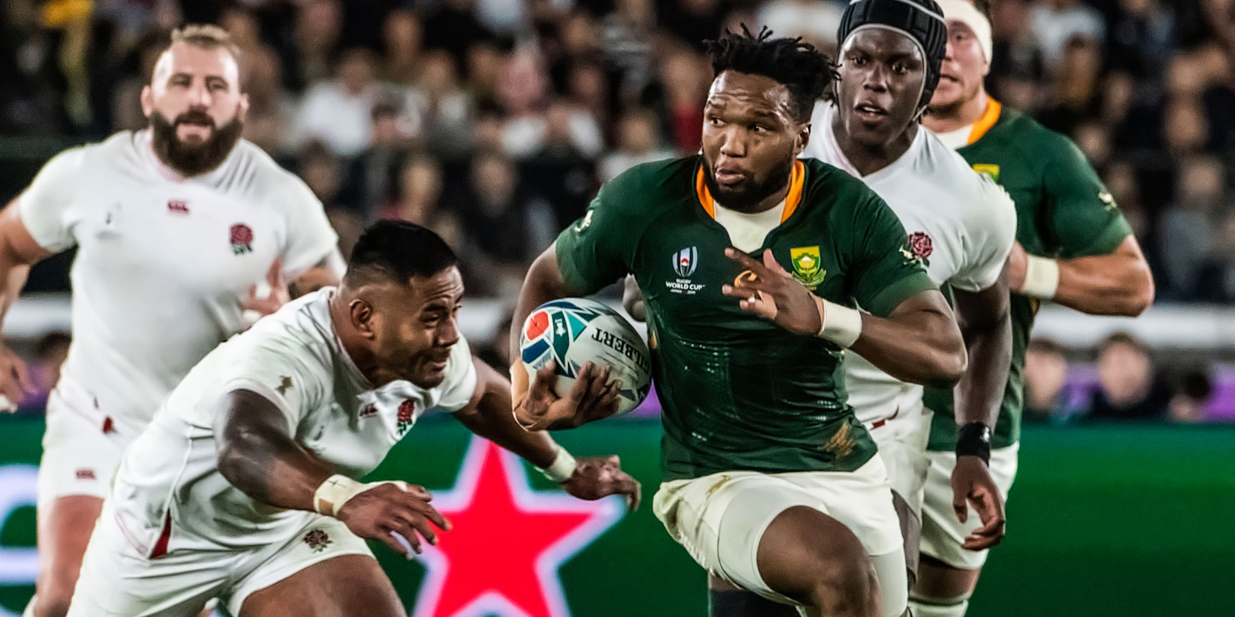 Lukhanyo Am in action against England in the RWC final in 2019.