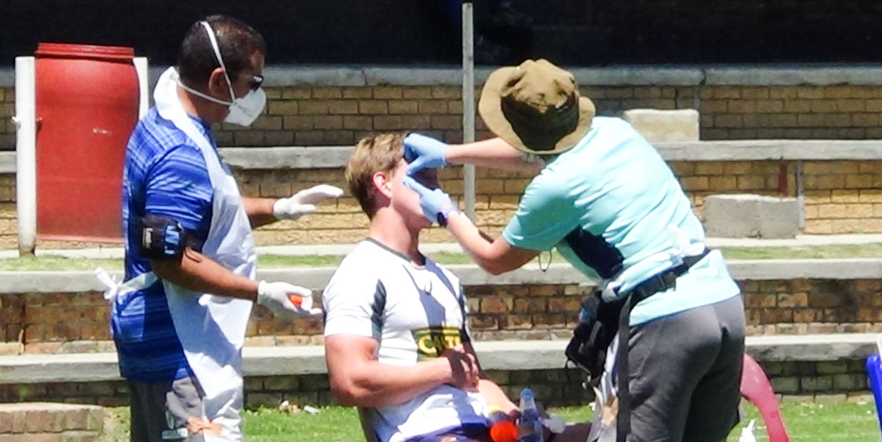 Christie Grobbelaar getting medical attention