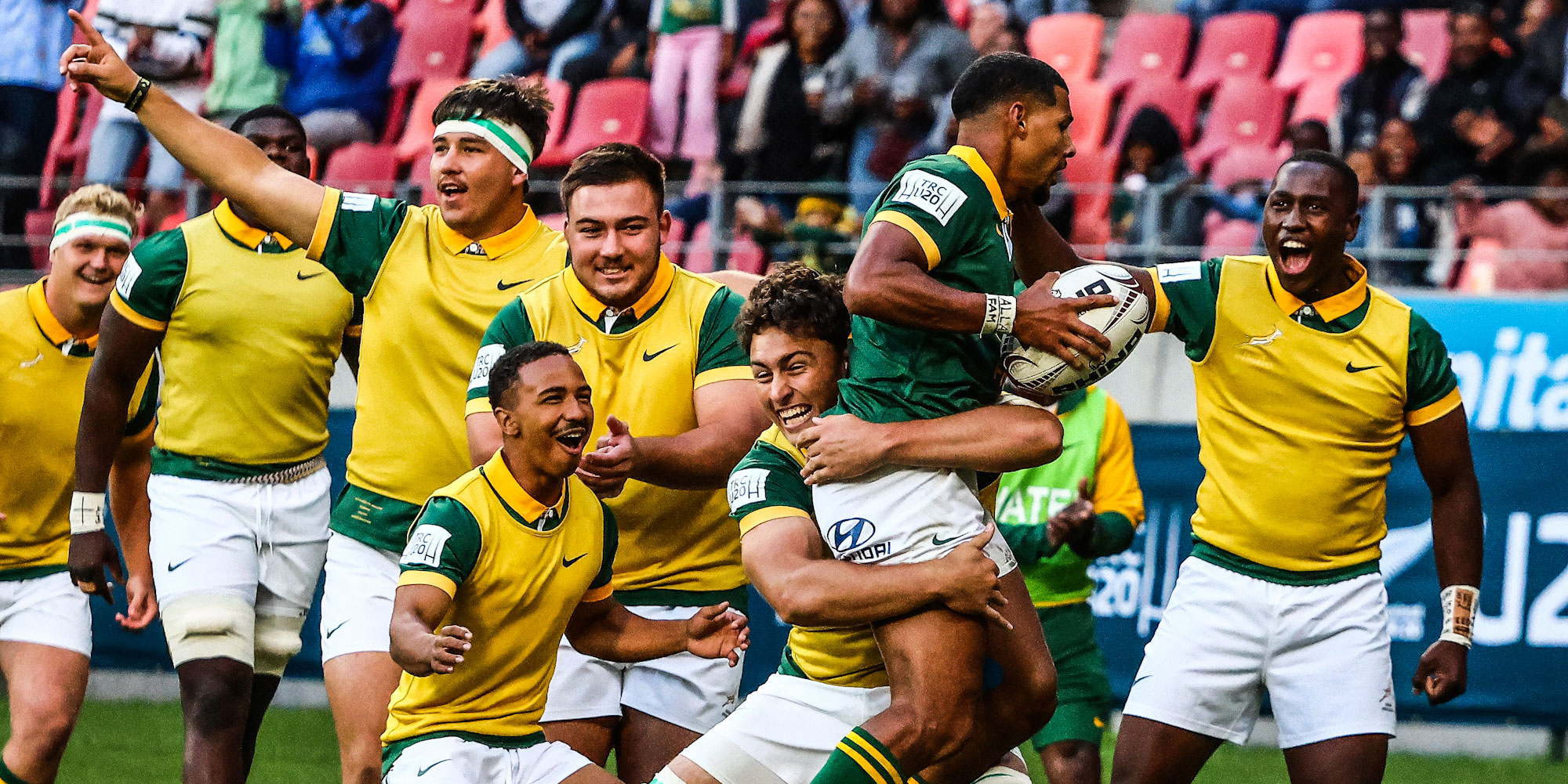 The Junior Boks celebrate Haashim Pead's second try.