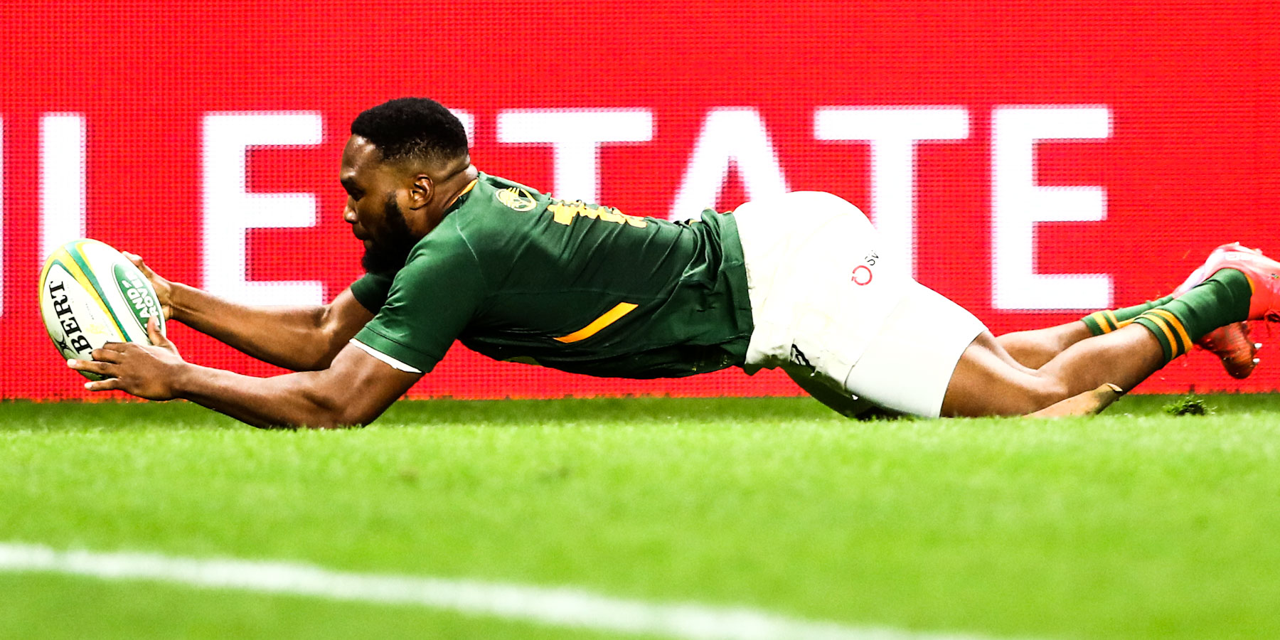 Lukhanyo Am goes over for the Boks' only try in the Test.