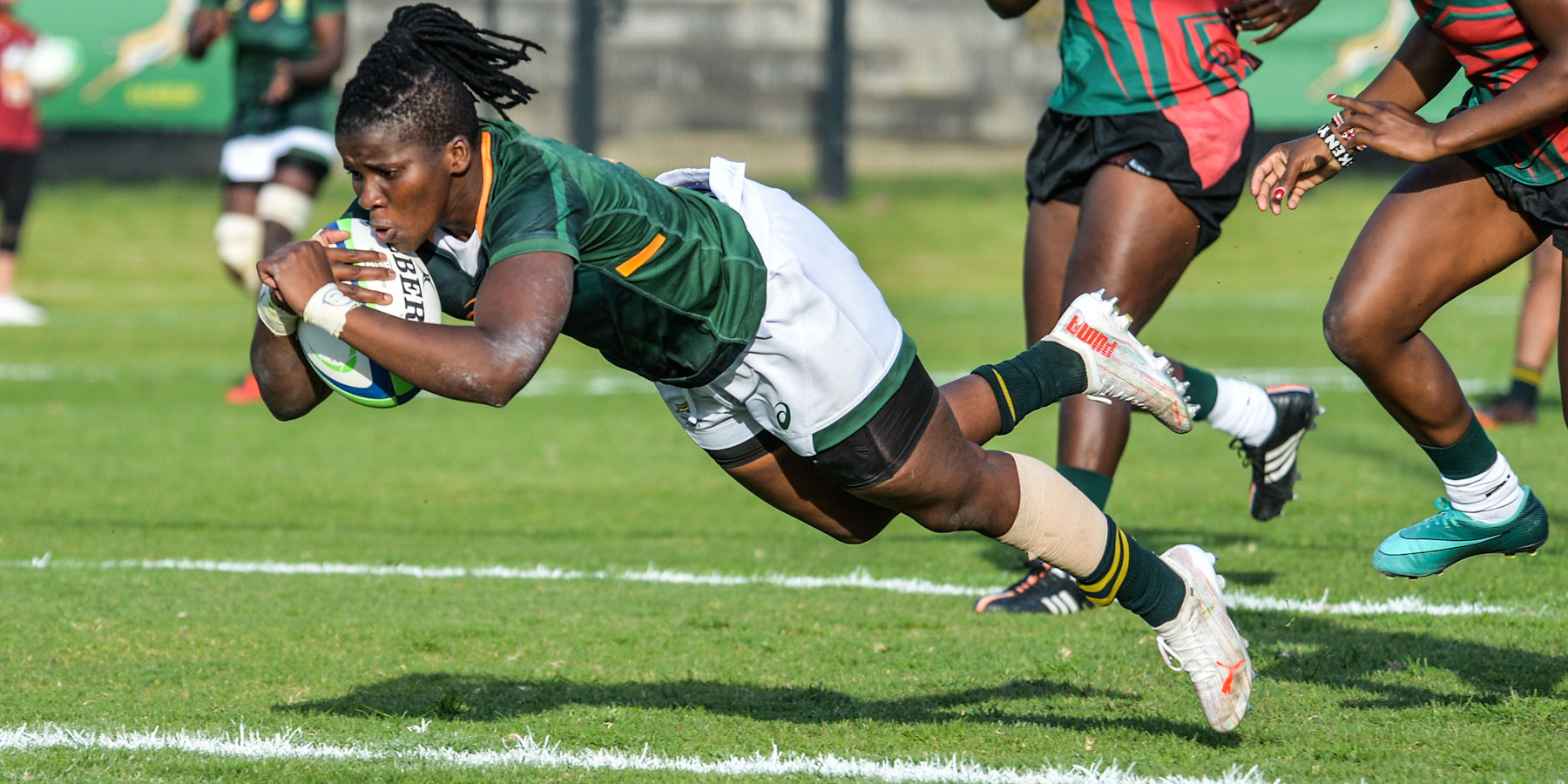 Lusanda Dumke scores for the Springbok Women against Kenya.