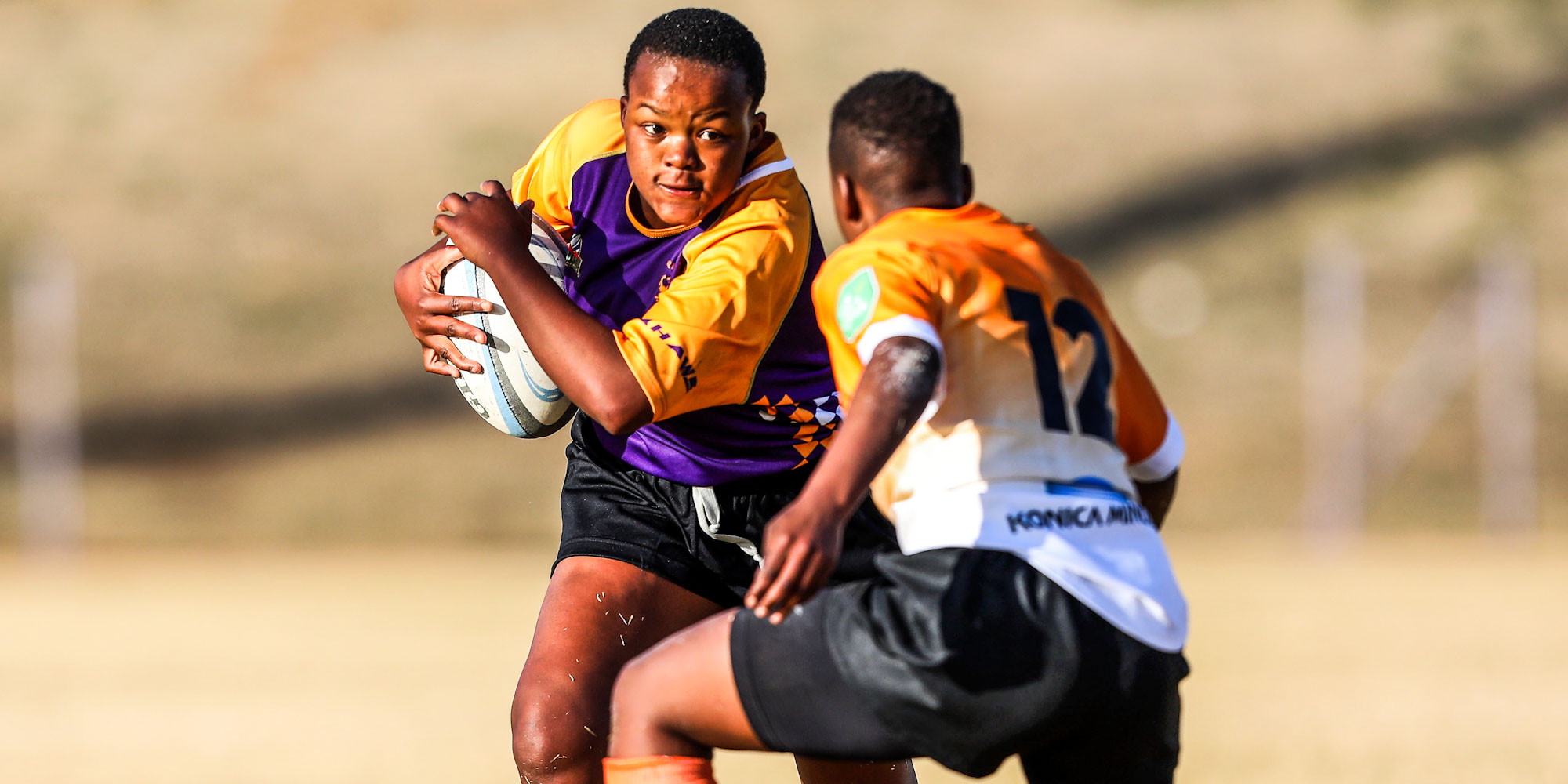 A player from the Griffons on the charge in their game against Free State.